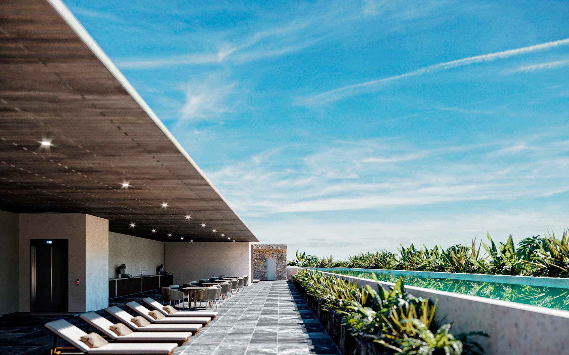 Rooftop pool and sun loungers at Koa, a condo development in Cancún (developer rendering)